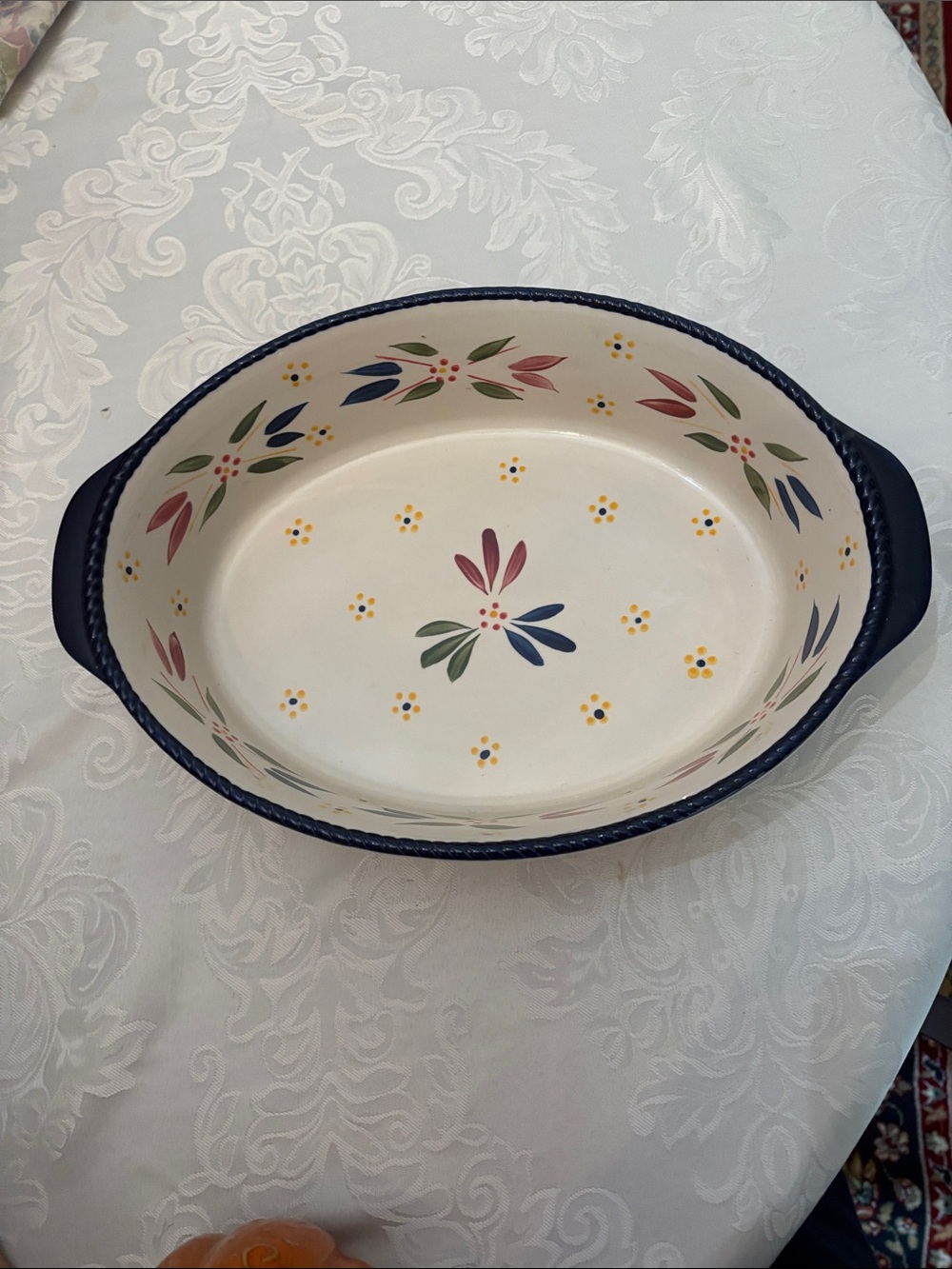 Cream Ceramic Oval Baking Dish with Blue Rim and Floral Motif
